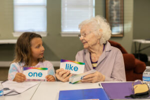 Tutor & scholar work together on sight words